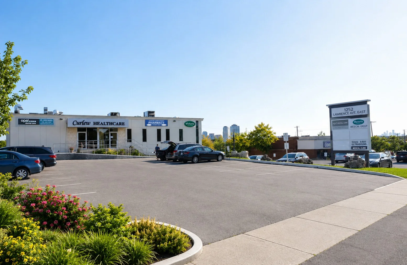 Victoria Medical Group in the Curlew Healthcare building at 1252 Lawrence Avenue East, with parking in front